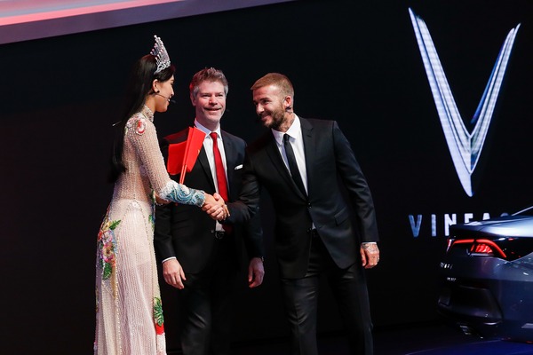 (L-R) Trần Tiểu Vy Miss Vietnam, David Lyon, Director of Design VinFast, and global sports star and style icon David Beckham